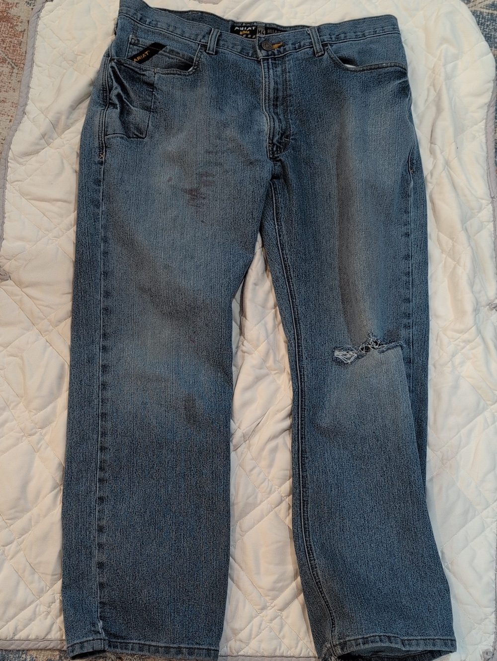 Ariat Men's Relaxed Boot Denim Jeans in Medium Blue with Knee Rip